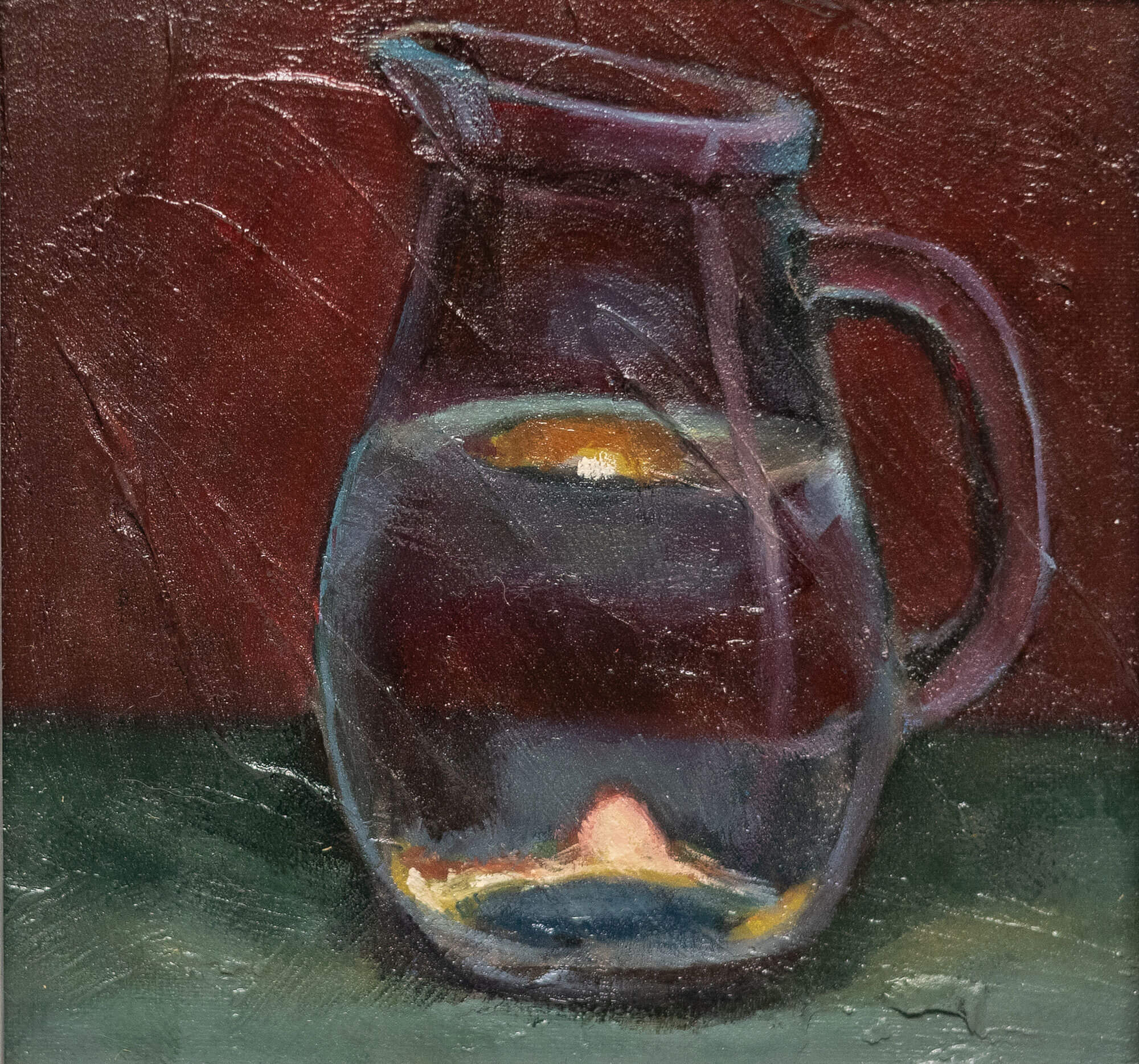 Still life oil painting of a clear glass jug filled with water, reflecting warm fiery orange tones against cool blue hues.