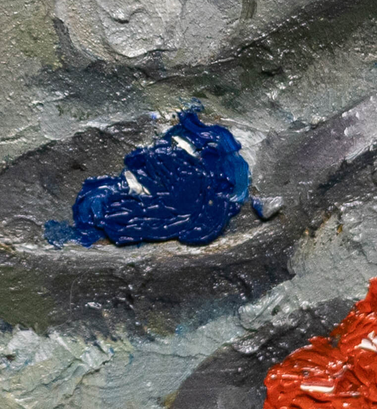 Classical still life oil painting of two silver spoons, one holding red pigment and one holding blue pigment, on a dark background.