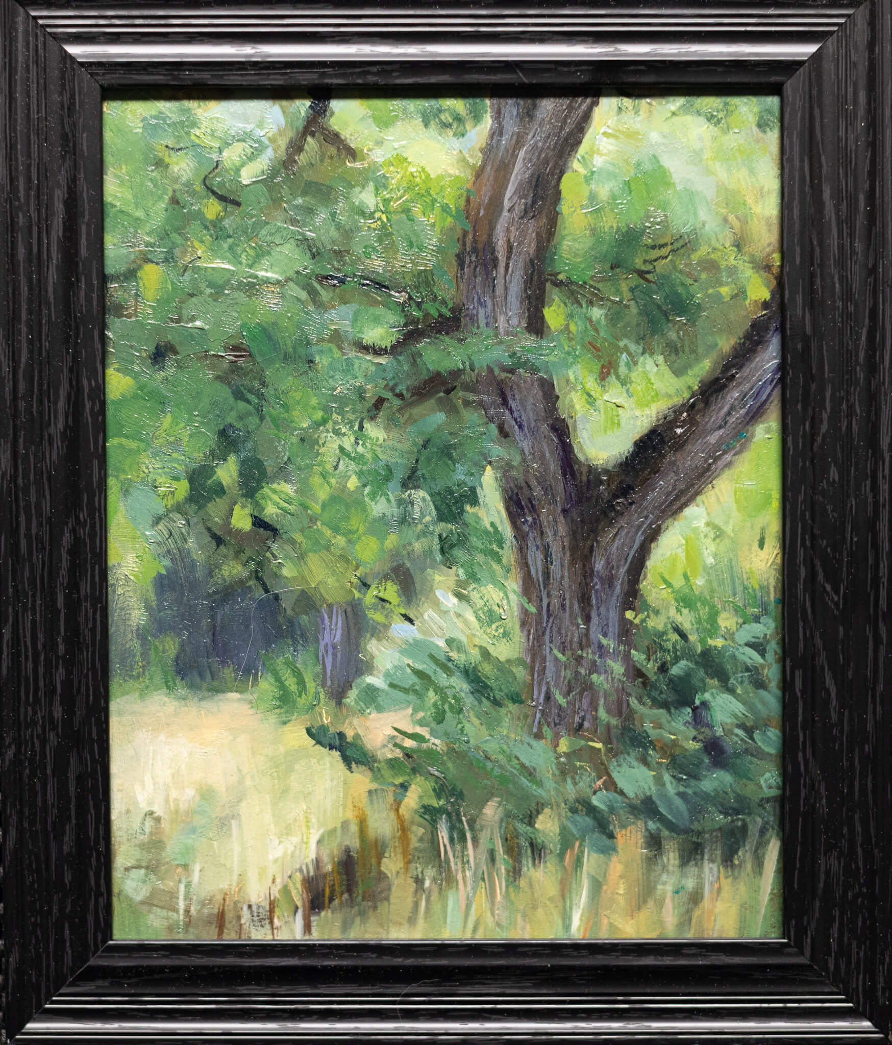 Impressionist plein air oil painting capturing the green filtered light and dense foliage of a woodland atmosphere.